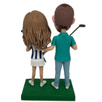 Cabezudo de pareja personalizado jugando al golf