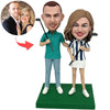 Cabezudo de pareja personalizado jugando al golf