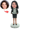 Cabezudos de profesoras personalizadas con atuendo de negocios negro