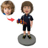 Cabezudo de niño personalizado con juguete