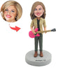Cabezudo femenino personalizado con guitarra rosa