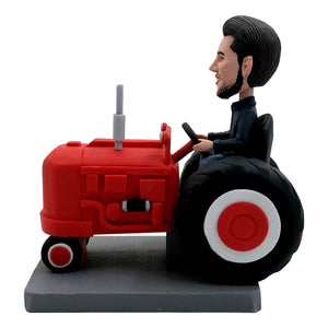 Cabezudo personalizado con vehículos agrícolas
