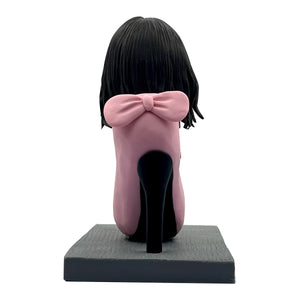 Cabezudo de dama elegante personalizado sentado en tacones altos