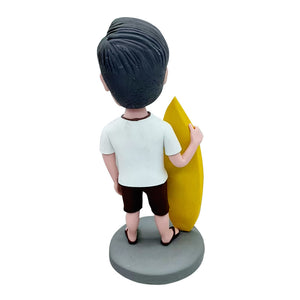 Cabezudo personalizado con tabla de surf