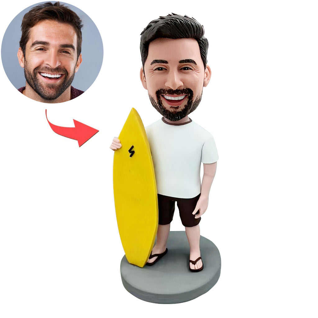 Cabezudo personalizado con tabla de surf