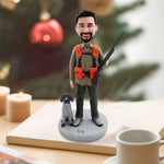 Figura cabezona de cazador personalizada con perro