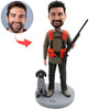 Figura cabezona de cazador personalizada con perro