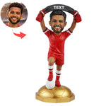 Muñeco cabezón personalizado de aficionado al fútbol con bufanda.