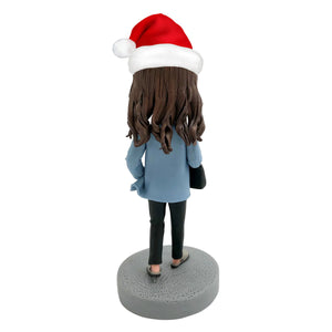 Cabezudo de mujer trabajadora personalizado con gorro de Papá Noel