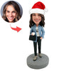 Cabezudo de mujer trabajadora personalizado con gorro de Papá Noel
