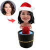 Cabezudo femenino personalizado bañándose con gorro de Papá Noel