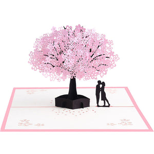 Tarjeta de felicitación emergente 3D de pareja romántica bajo el cerezo