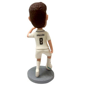 Cabezudo de jugador de fútbol personalizado en camiseta blanca