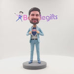 Cabezudo personalizado de Super Papá con traje azul