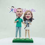 Cabezudo de pareja personalizado jugando al golf